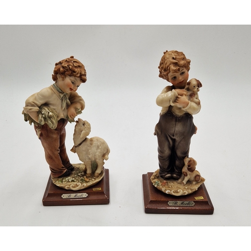 51 - CAPODIEMONTE PORCELAIN 18.5cm FIGURINES (2) By B.Merli Signed And Dated 1983 MOUNTED ON POLISHED WOO... 