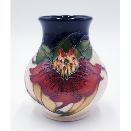 73 - MOORCROFT 10.2cm VASE (Shape No 869/4) IN THE ANNA LILY DESIGN By Designer Nicola Slaney R.R.P. £255... 