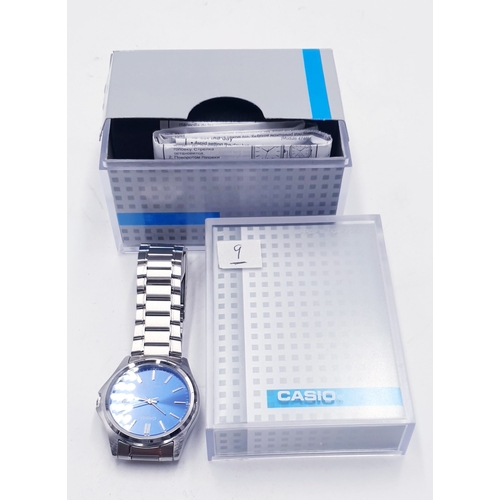 83 - CASIO WRIST WATCH (Model No MTP 1183) (Original Box And Paperweight)