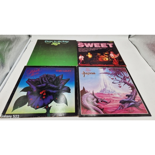 244 - ROCK VINYL LPS (4)
YES CLOSE TO THE EDGE GATEFOLD SLEEVE. THE SWEET SELF TITLED. THIN LIZZY BLACK RO... 