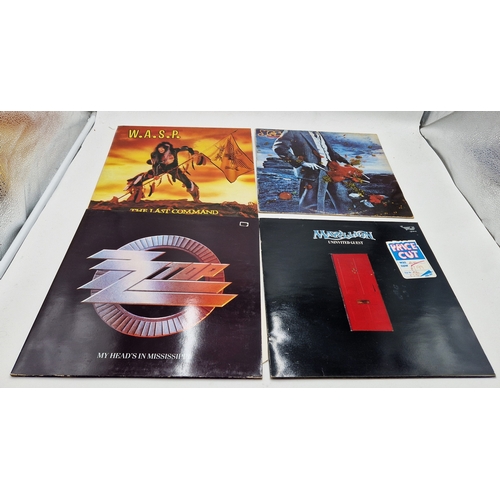 249 - ROCK VINYL LPS + 12 INCHES (4)
WASP THE LAST COMMAND + INNER (TEAR ON FRONT COVER). YES TORMATO. ZZ ... 