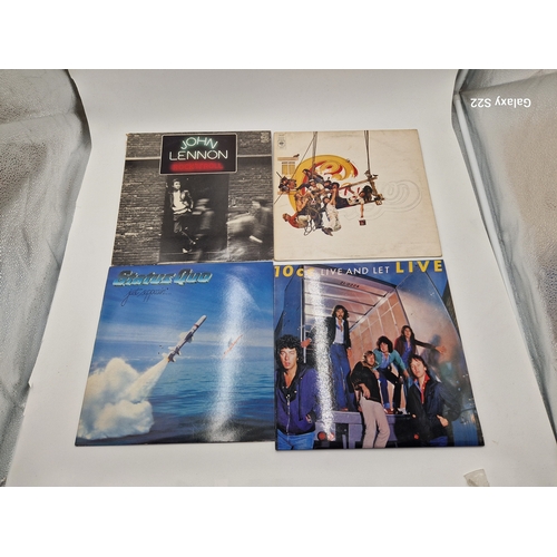 834 - ROCK VINYL LPS (4)
JOHN LENNON ROCK N ROLL. CHICAGO GREATEST HITS. STATUS QUO JUST SUPPOSIN’. 10CC L... 