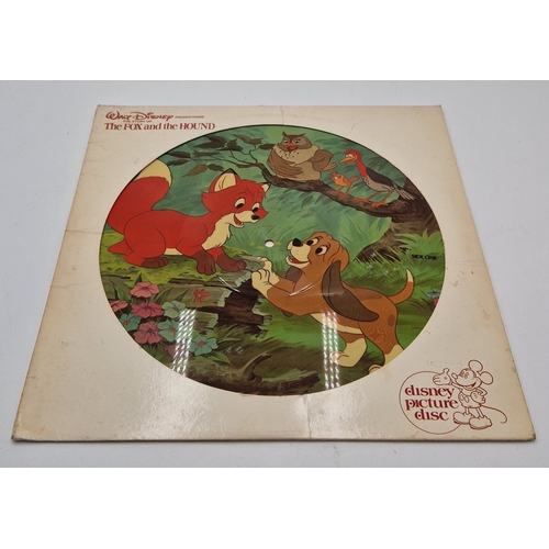 105 - WALT DISNEY PICTURE DISC VINYL LP (1)
THE FOX AND THE HOUND IN A DIE-CUT SLEEVE. THE VINYL IS VG+. T... 