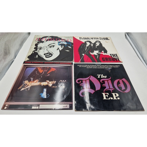 114 - ROCK VINYL 12 INCH SINGLES (4)
THE DAMNED ELOISE.// DAWN AFTER DARK THE GROOVE. //DIRE STRAITS MONEY... 