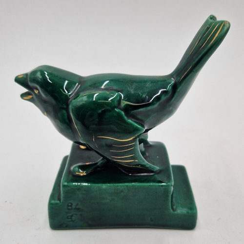 68 - SAINT CLEMENTS POTTERY (France) 10cm x 13cm MODEL OF A BIRD Signed H. Ghillie. (Rare)
(The faience f... 