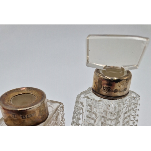 98 - SILVER COLLARED GLASS PERFUME BOTTLES 1907 & 1923