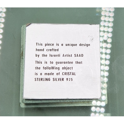 1062 - STERLING SILVER (925) PLAQUE MOUNTED IN A FRAME