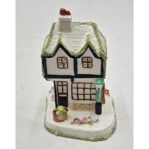 116 - COALPORT CHINA 12.1cm MODEL OF A COTTAGE 