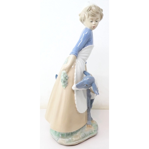 342 - LLADRO (Nao) PORCELAIN Extra Large 29cm CHARACTER FIGURINE OF A GIRL WITH GOAT.
(NAO pottery, a bran... 