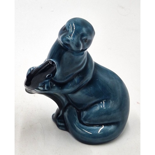 252 - JERSEY POTTERY FLARED VASE Plus A POOLE POTTERY MODEL OF AN OTTER With A FISH