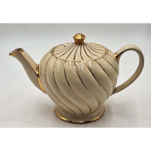 258 - SADLER SWIRL TEAPOT
(Sadler pottery, founded in 1882 by James Sadler in Burslem, Stoke-on-Trent, is ... 