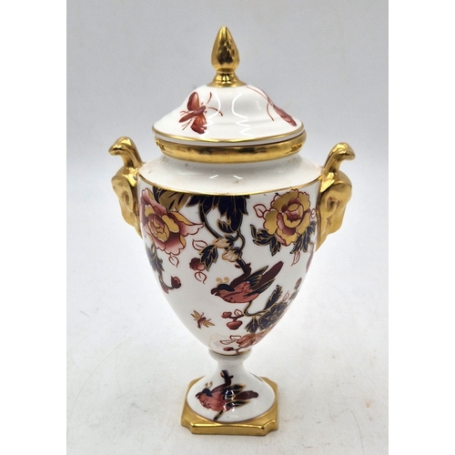 260 - COALPORT CHINA 14cm LIDDED JAR IN THE HONG KONG DESIGN FEATURING GILT TWIN RAMS HEAD HANDLES And GIL... 