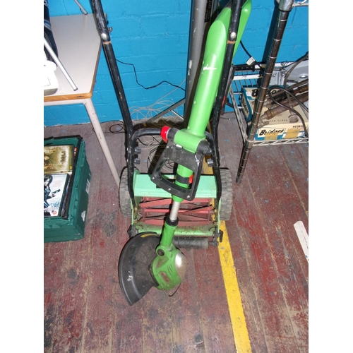 301 - A cordless strimmer & push along mower