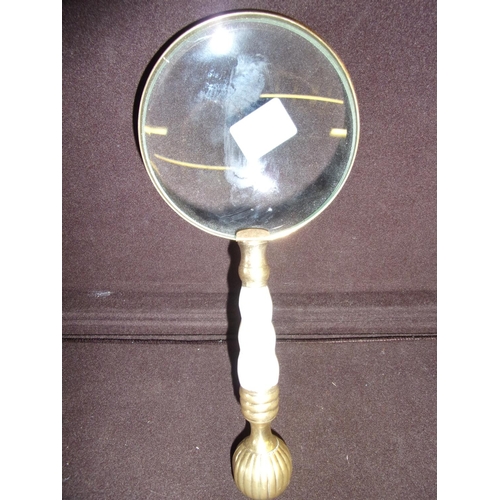 348 - A Mother of pearl handled magnifying glass