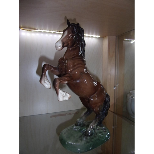 370 - A Beswick model of a rearing Welsh cob horse. Repair to ear.