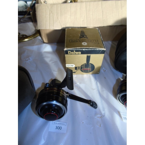 A Daiwa Harrier 123M closed faced fishing reel box