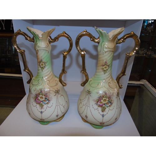 183 - A pair of Crown Devon handled vases. 30cm H 