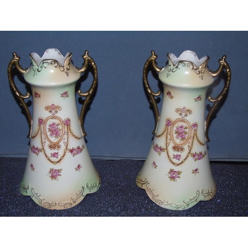 46 - A pair of Crown Devon handled vases, 25cm H