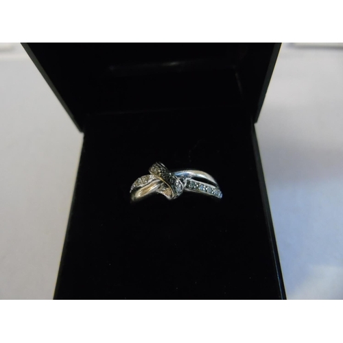 150 - A 9ct white gold & diamond bow ring size M1/2