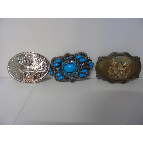 167 - Three vintage American style belt buckles