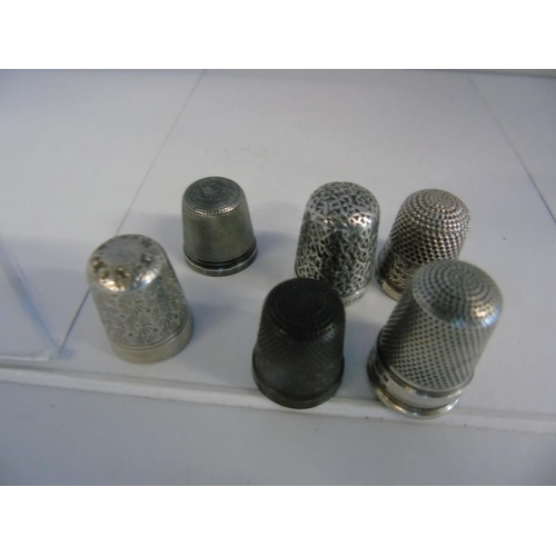 166 - Seven hallmarked silver thimbles including Charles Horner