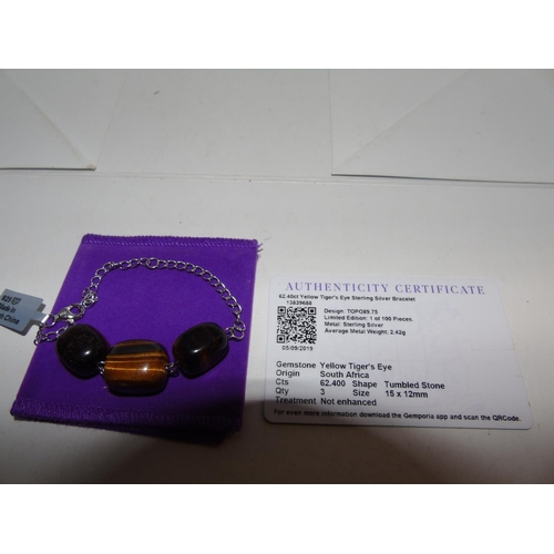 168 - A Sterling silver & yellow tigers eye bracelet with certificate