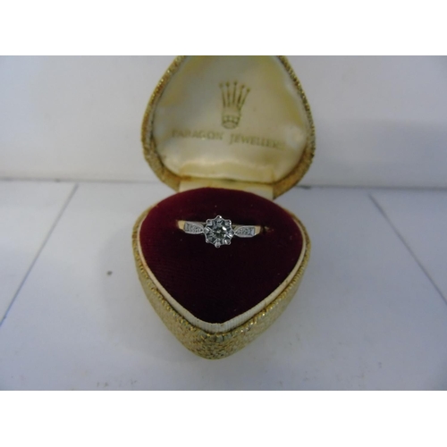 119 - A 18ct gold & platinum diamond solitaire ring size K