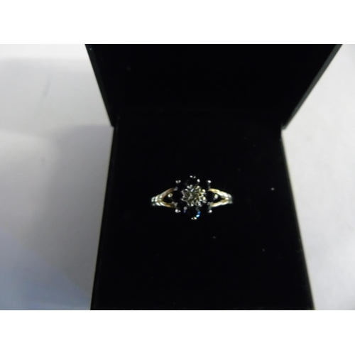 129 - A 9ct gold sapphire & diamond cluster ring size N 1/2