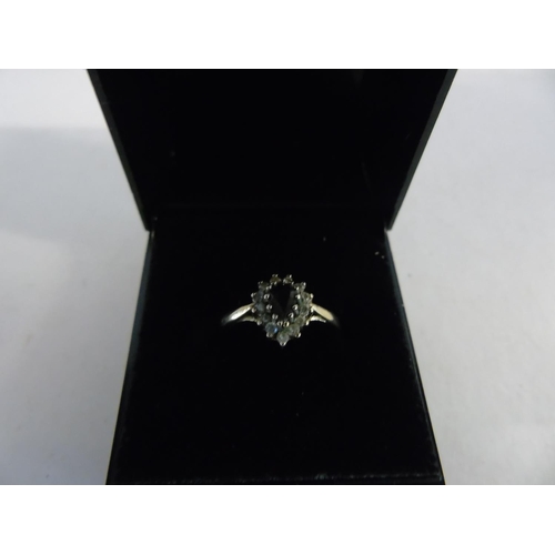143 - A 9ct gold sapphire cluster ring size 0