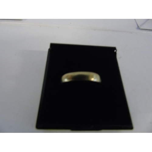 145 - A 9ct gold plain band ring size J 1/2