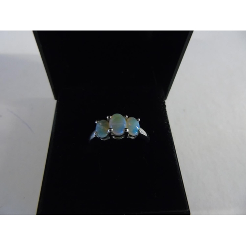 148 - A Sterling silver opal trilogy ring size 0