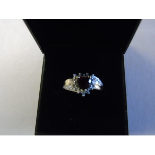 175 - A 9ct gold diamond & garnet heart ring size M 1/2