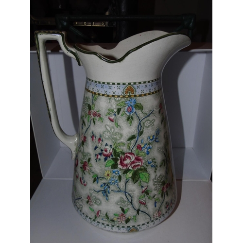 27 - A large hand decorated Royal Corona ware jug