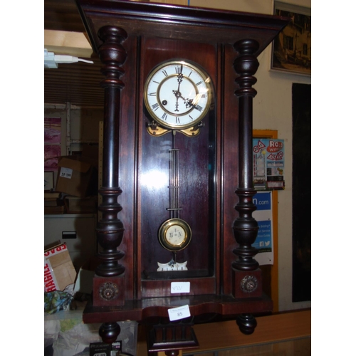 80 - A German Vienna style wall clock in good working order.
