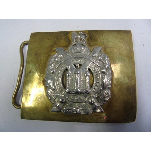 101 - A WW2 Scottish Kings Own Borders belt buckle