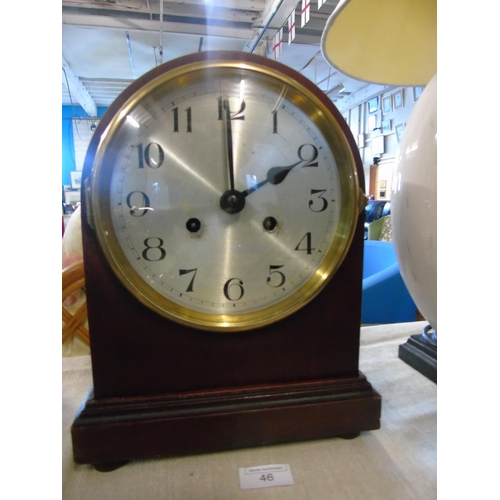 20 - A good quality art deco period mahogany cased silvered dial mantel clock in good working order