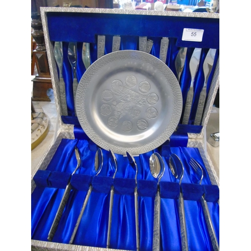 26 - A cased Norwegian viking themed cutlery set & a Norwegian pewter plate