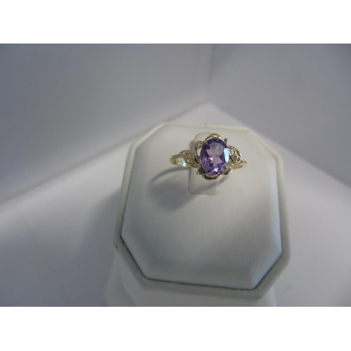 168 - A 9ct gold diamond & amethyst ring size P 1/2