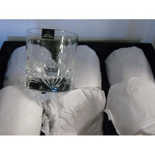 41 - A boxed set of six Royal Doulton hand cut crystal whiskey tumblers