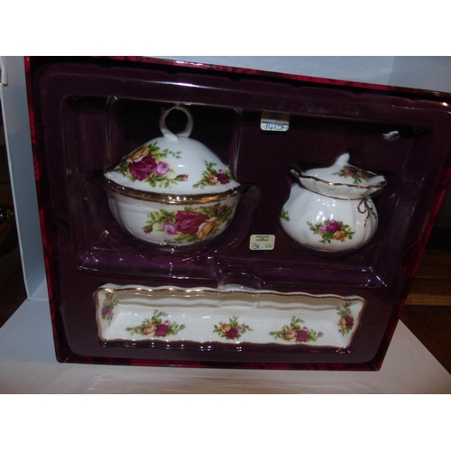 54 - A boxed as new Royal Albert OCR gift set