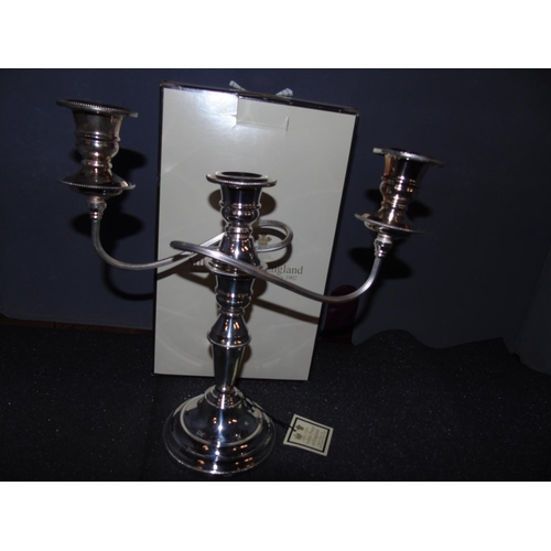 63 - A quality boxed Arthur Price silver plated candlearbra