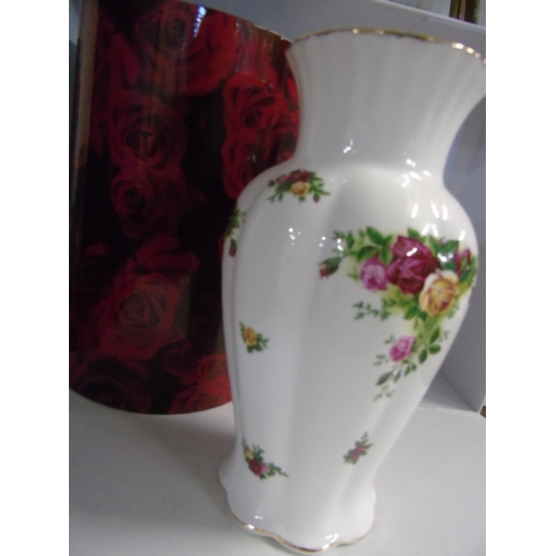 64 - A boxed as new Royal Albert OCR vase