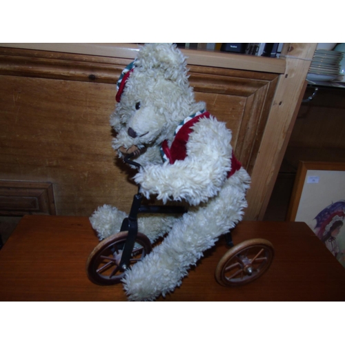 71 - A vintage style teddy bear on a tricycle