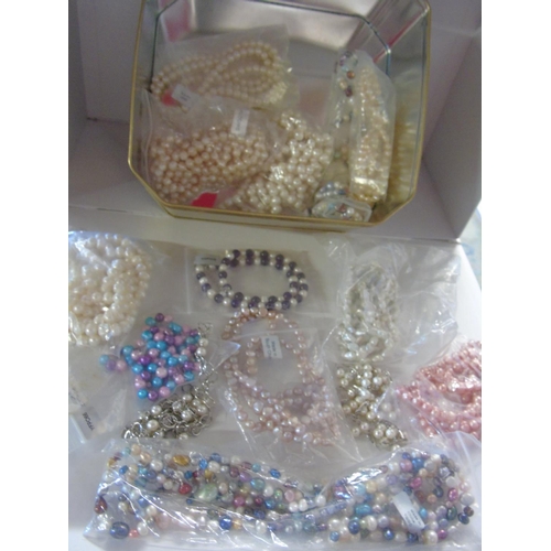 90 - A large selection of simulated pearl necklaces all new