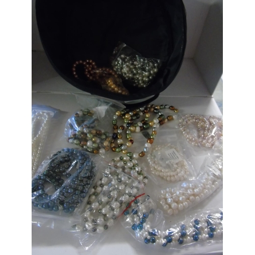 92 - A selection of new simulated pearl necklaces