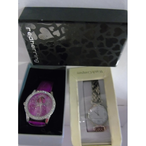 94 - Two new boxed ladies watches