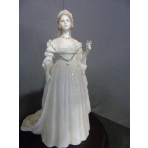 149 - A limited edition Coalport figurine 'Queen Victoria' on a wooden base