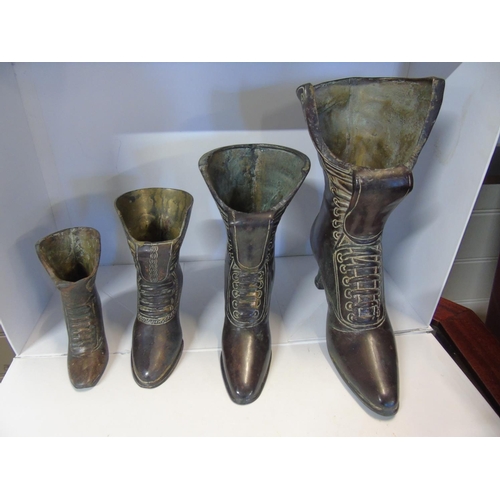 36 - Four unusual cast bronze and graduated Victorian style Ladies boots