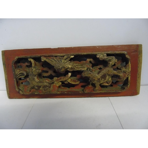 473 - An antique Chinese hand carved wooden panel