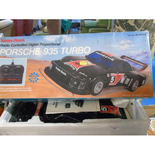 22 - A boxed Radio Shack Porsche 935 turbo remote controlled car